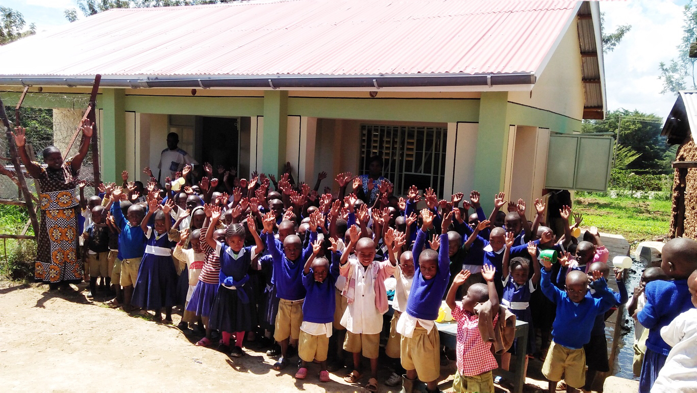 SOFDI | Pre-School Children in front of new kitchen